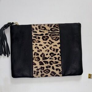 BIBA BRAND BLACK LEATHER WRISTLET WITH CHEETAH PRINT HAIR IN MIDDLE ZIP CLOSURE